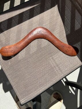 Australian Handcrafted Brown Wooden Boomerang with Etched Design.